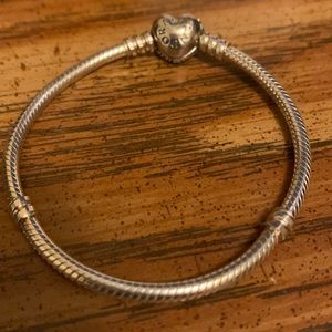 brand new pandora charm bracelet never worn have 2 others i wear on occasion